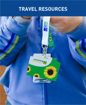 Travel Resources header with a photo of a member of YVR's Guest Experience team holding a Sunflower Program lanyard