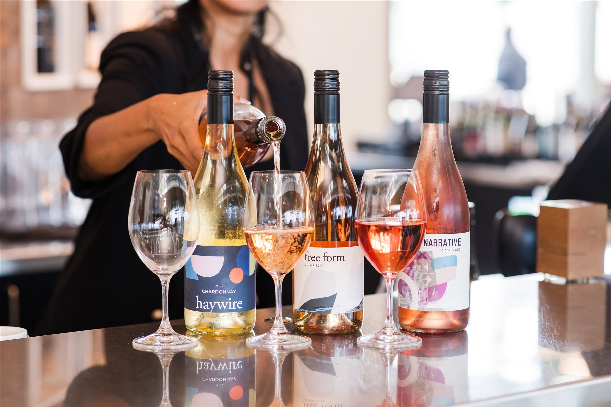 wine being poured at yvr