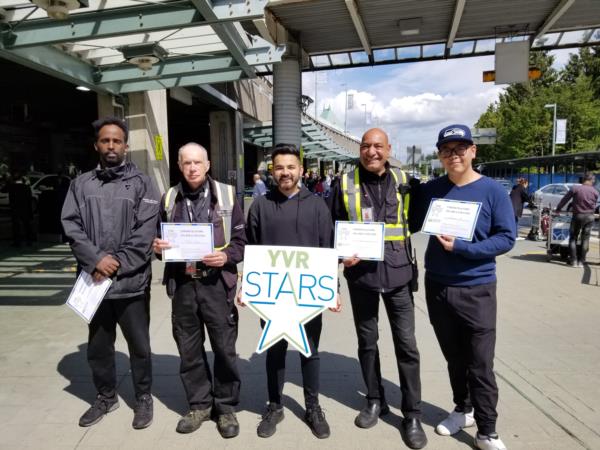 Paladin Group members receiving YVR stars award