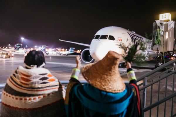 WestJet Dreamliner pulls in to the gate