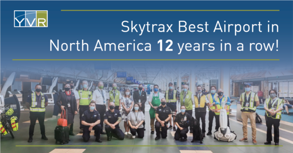 Skytrax Best Airport in North America 12 Years in a Row with airport team members group photo