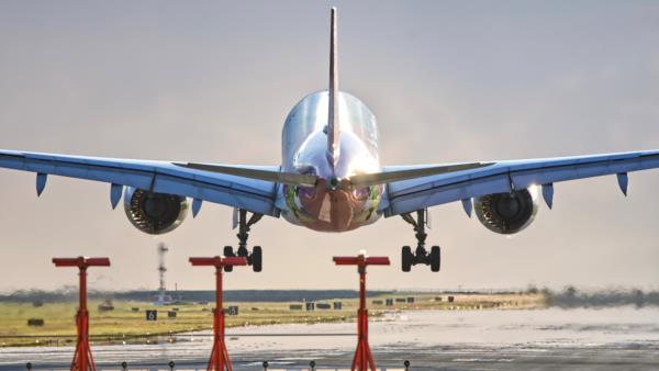 A Sichuan Airline A350 landing on Runway 26L as seen from the Larry Berg Flight Path Park