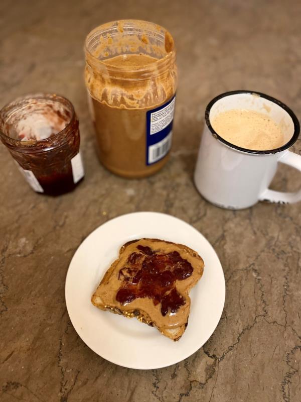 Robyn’s breakfast of peanut butter and jelly on toast with a cup of coffee. 