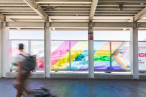 new mural on Canada Line walkway