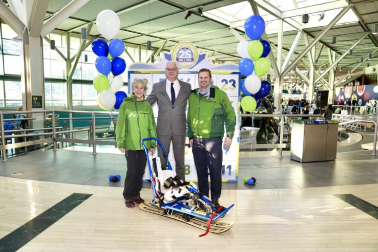 YVR's President and CEO with representatives from Vancouver Adaptive Snow Sports