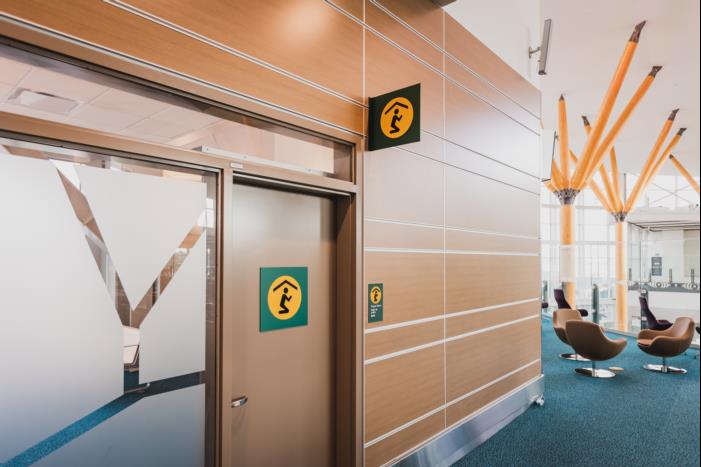 Outside multi-faith prayer room with signage  