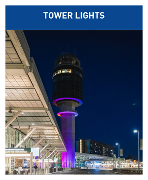 Airport Tower Lights. The airport control tour shines purple, pink and blue at night time.